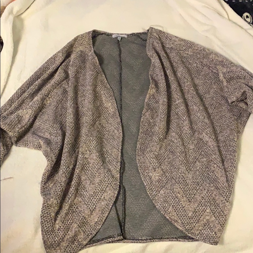 Worn maybe twice. Super cute dressed up or down!